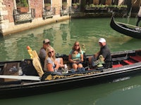 a black gondola on the water